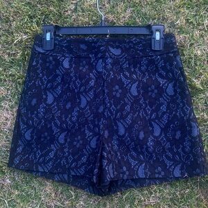 Express Blue and black mid rise , floral lace, skirt shorts 🪻